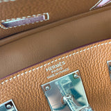 Side view of poised structured handbag