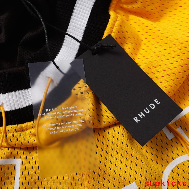 Side profile of Rhude luxury clothing with monogram-inspired silhouette
