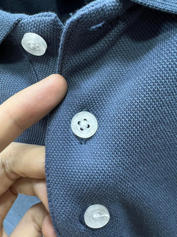 Full styled look of Louis Vuitton luxury clothing with logo-detail design