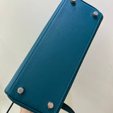 Polished bag shown from front angle