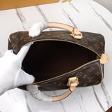 Back view of signature polished women's handbag – women's luxury handbag