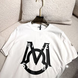 Side profile of Moncler luxury clothing with monogram-inspired silhouette
