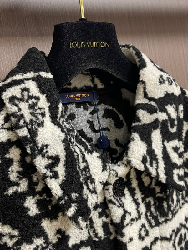 Close-up detail shot of Louis Vuitton luxury clothing with logo-detail design