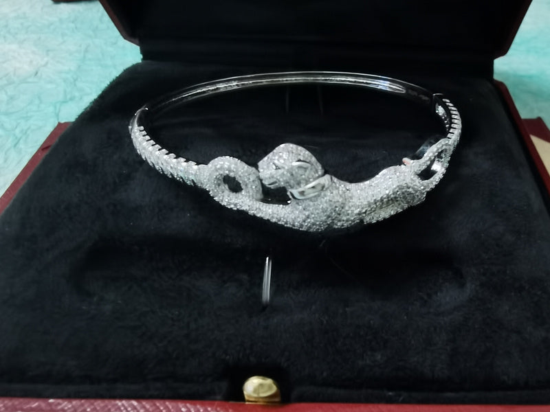 Angled view of Cartier unisex jewelry piece