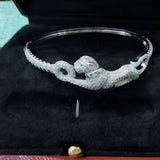 Angled view of Cartier unisex jewelry piece