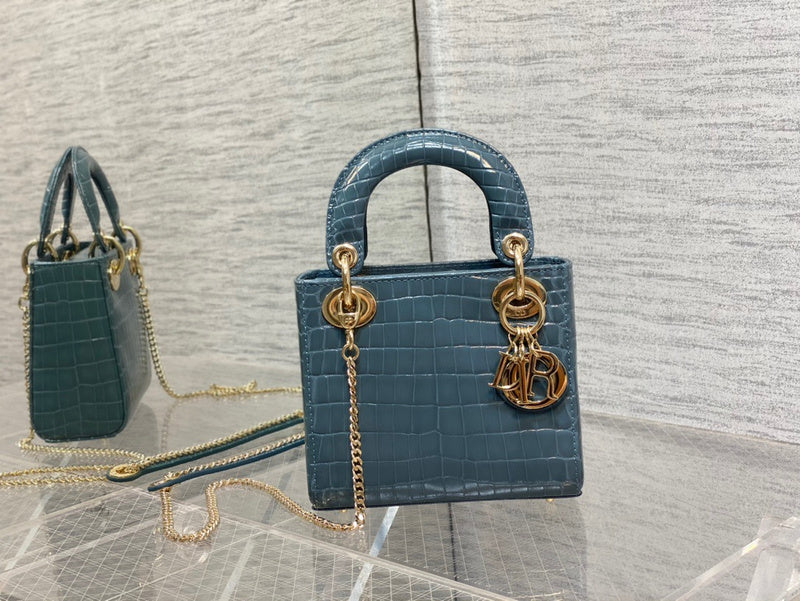Styled lifestyle shot of statement sleek women's handbag – women's luxury handbag