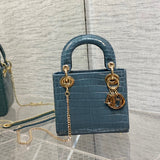 Styled lifestyle shot of statement sleek women's handbag – women's luxury handbag
