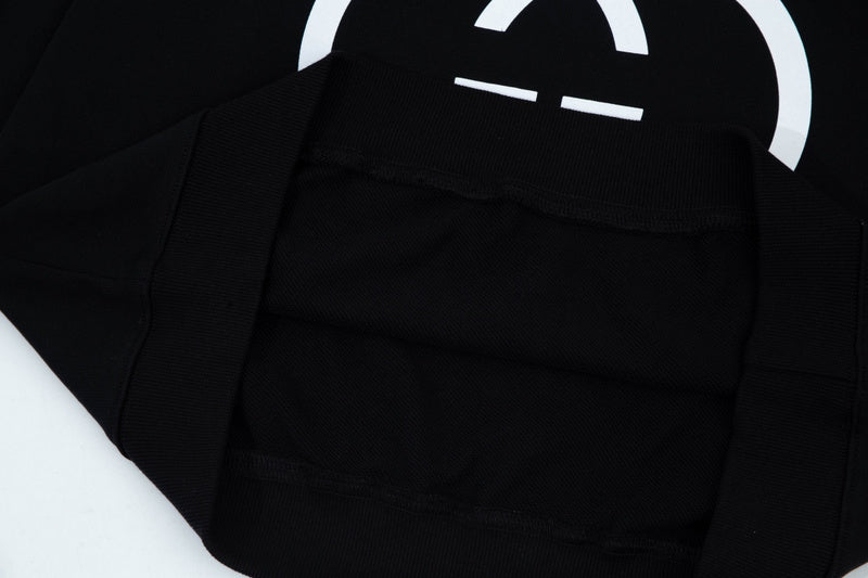 Front view of Gucci luxury clothing with everyday silhouette