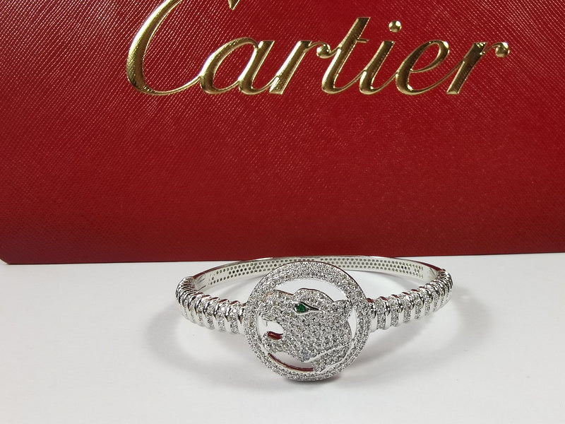 Front view of Cartier unisex jewelry piece