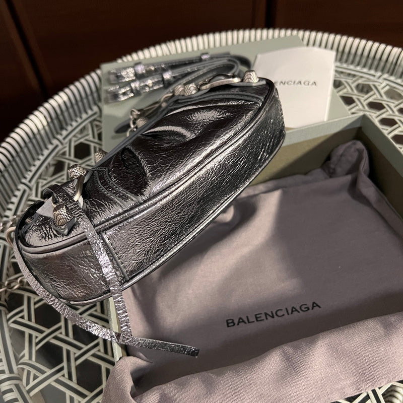 Styled lifestyle shot of refined sleek women's handbag – women's statement bag