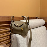  Modern crossbody bag carried on shoulder