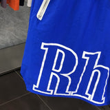 Flat lay presentation of Rhude luxury clothing with logo-detail design