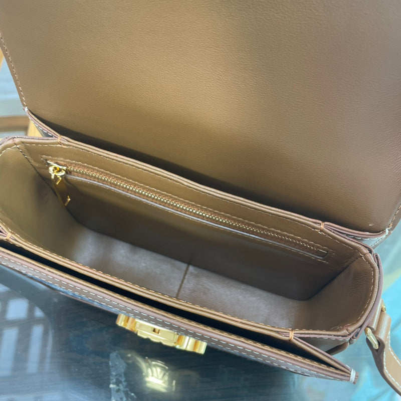 Front view of elevated polished women's handbag – women's everyday handbag