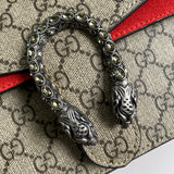 Handle and strap detail of refined polished women's handbag – women's luxury accessory