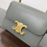 Styled lifestyle shot of statement everyday-luxe women's handbag – women's luxury accessory