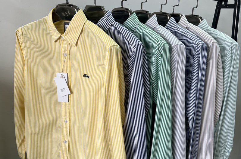 Front view of Lacoste luxury clothing with monogram-inspired silhouette