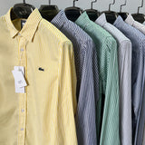 Front view of Lacoste luxury clothing with monogram-inspired silhouette