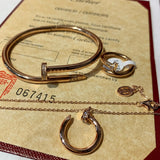 Side view of Cartier unisex jewelry piece
