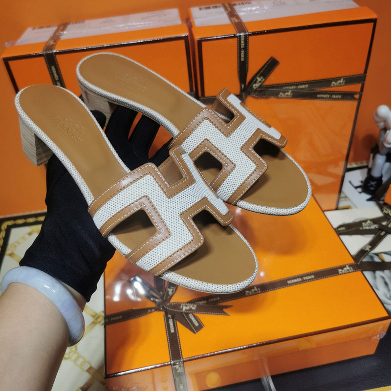 Hermès White Slide Sandals - Sole Detail View