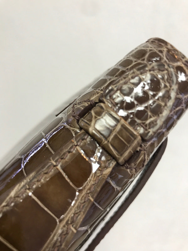 Side view of clean-lined structured handbag