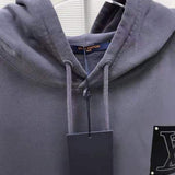 Full styled look of Louis Vuitton luxury clothing with relaxed-fit cut
