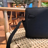 Side view of fluid structured handbag