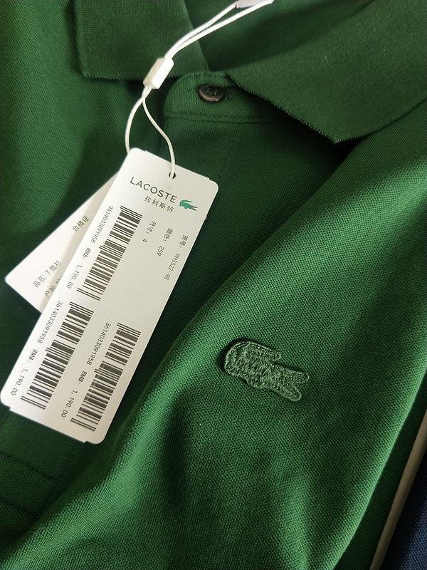 Side profile of Lacoste luxury clothing with signature branding