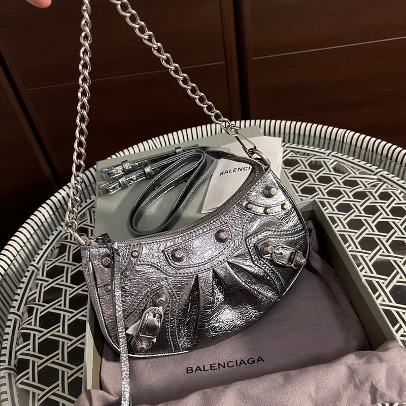 Front view of refined sleek women's handbag – women's statement bag