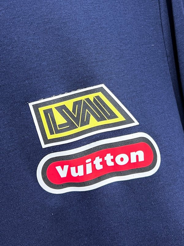 Flat lay presentation of Louis Vuitton luxury clothing with streetwear-inspired cut