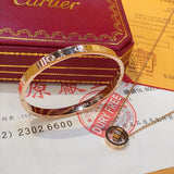 Angled view of Cartier unisex jewelry piece