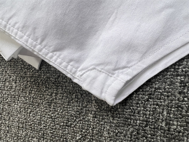 Side profile of Lacoste luxury clothing with logo-detail design