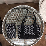 Front view of chic polished women's handbag – women's luxury handbag
