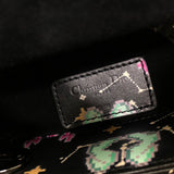 Side profile of premium chic women's handbag – women's luxury accessory