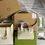 Front view of sleek refined women's handbag – women's designer-style accessory
