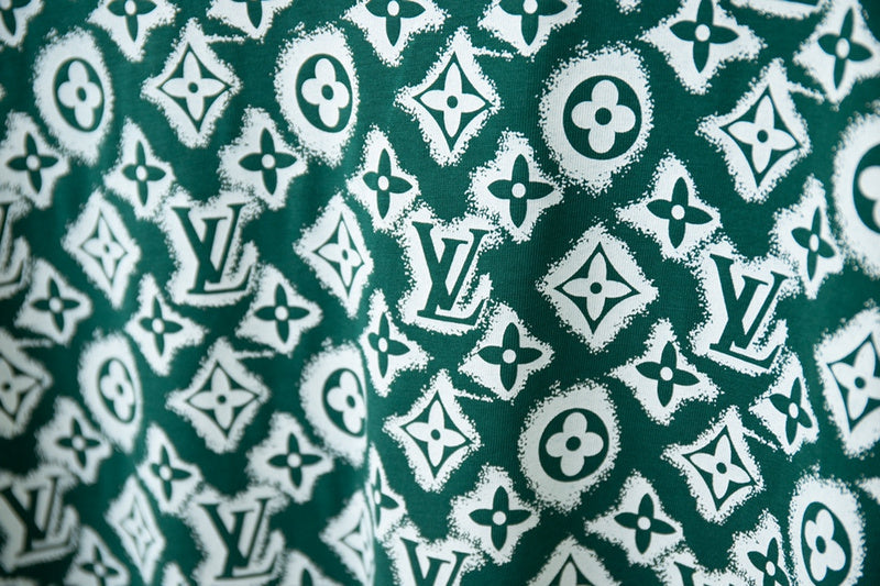 Flat lay presentation of Louis Vuitton cotton t-shirt with monogram-inspired silhouette