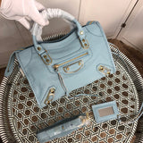 Front view of chic everyday-luxe women's handbag – women's statement bag