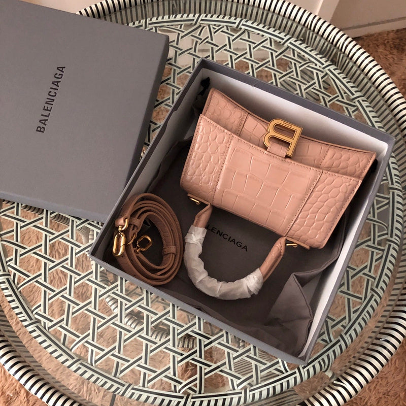 Side profile of polished elevated women's handbag – women's luxury accessory