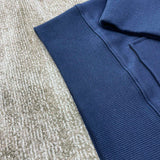 Three-quarter angle view of Amiri luxury piece style No.041