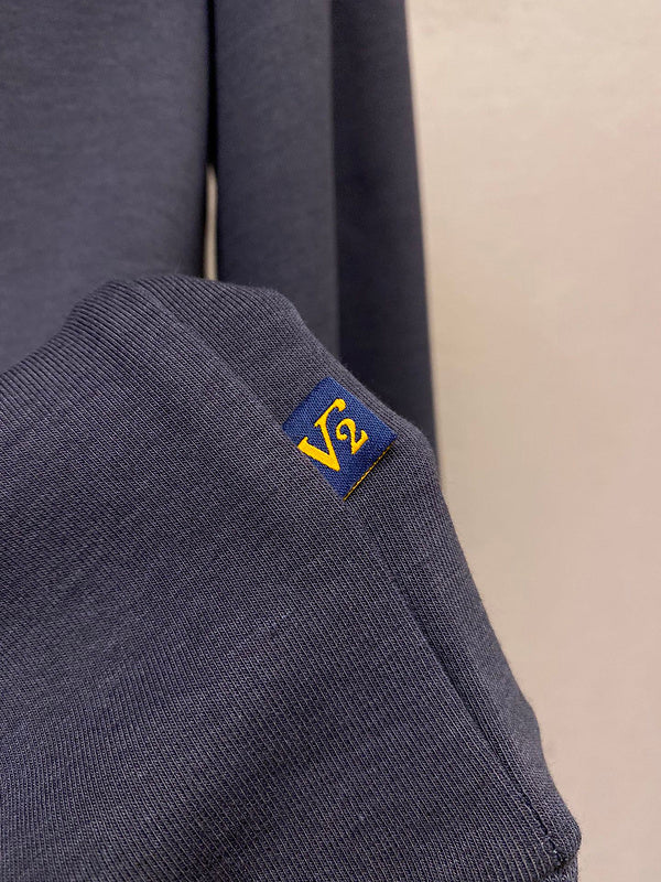 Front view of Louis Vuitton luxury clothing with runway-inspired design