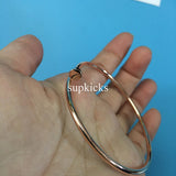 Angled view of Cartier unisex jewelry piece