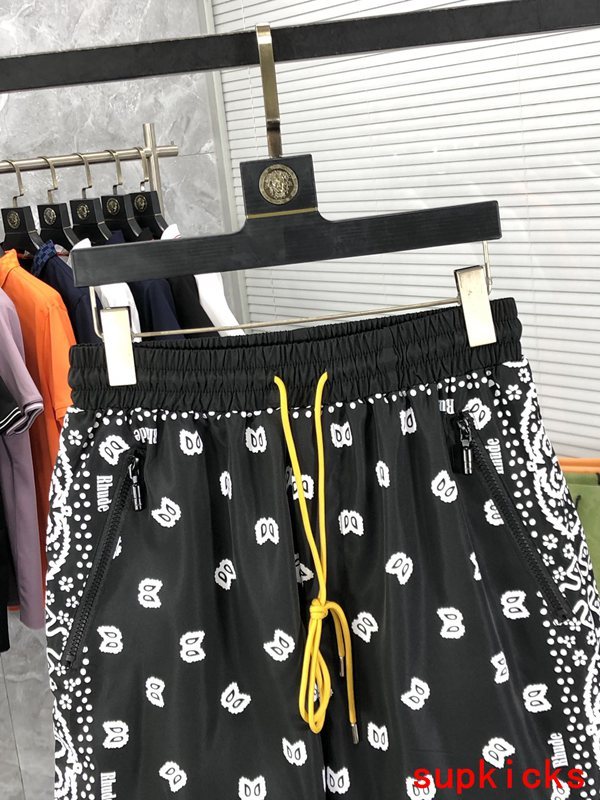 Close-up detail shot of Rhude luxury clothing with label-forward styling
