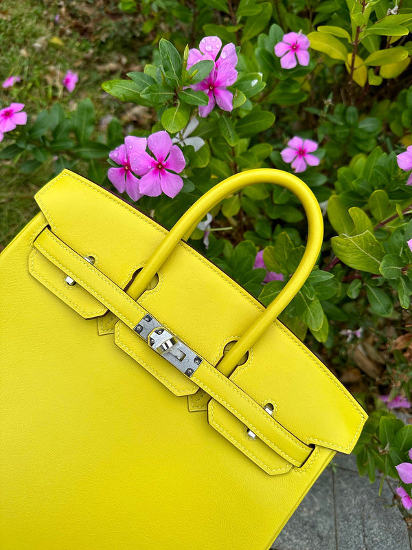 Side view of fluid structured handbag