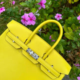 Side view of fluid structured handbag