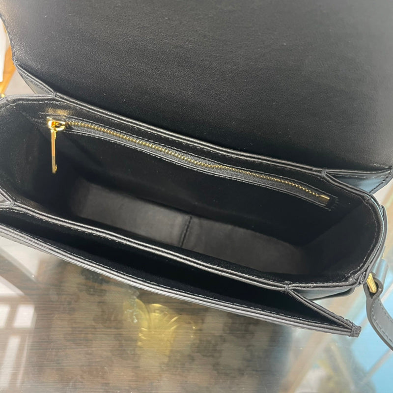 Interior view of statement refined women's handbag – women's designer-style accessory