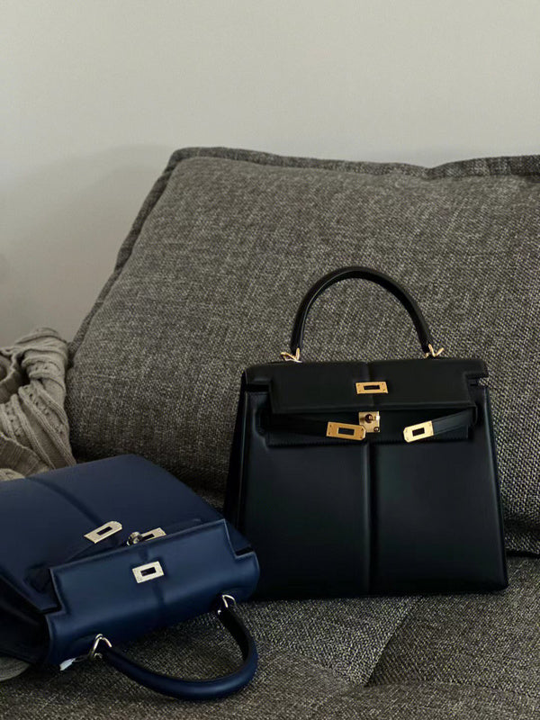 Side view of polished structured handbag