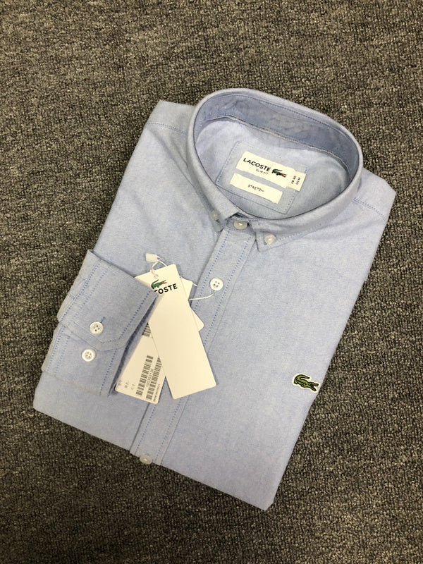 Full styled look of Lacoste luxury clothing with logo-detail design