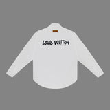Close-up detail shot of Louis Vuitton luxury clothing with monogram-inspired silhouette