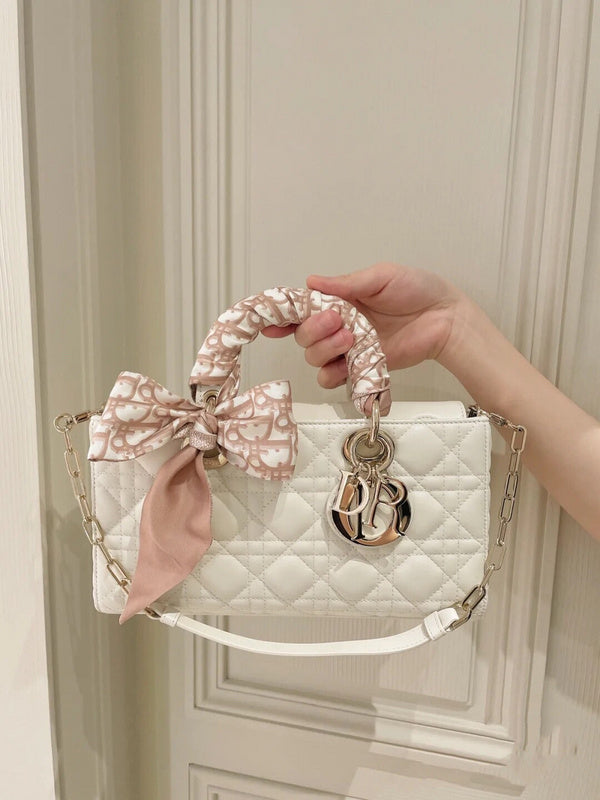 Front view of elevated modern women's handbag – women's luxury accessory