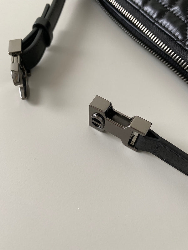 Handle and strap detail of elevated refined women's handbag – women's luxury handbag