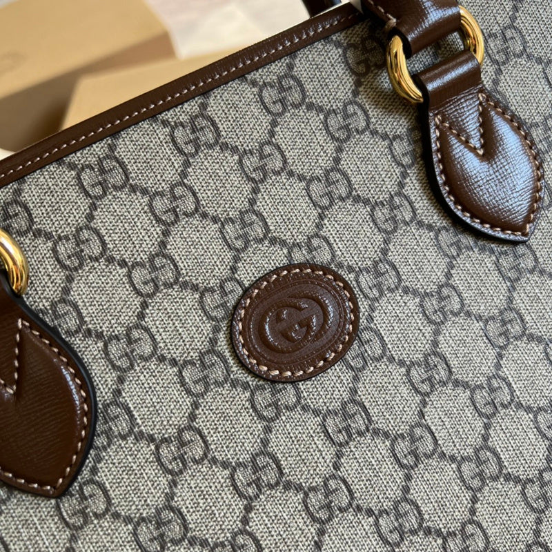 Handle and strap detail of sleek everyday-luxe women's handbag – women's everyday handbag